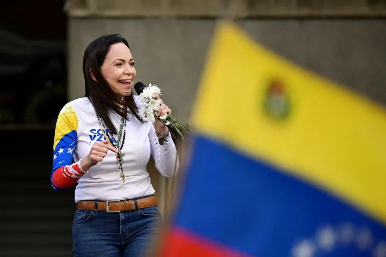 MACHADO DICE FUERA, WASHINGTON DICE INVITADOS Y VENEZUELA SIGUE SIN FECHA PARA VOTAR